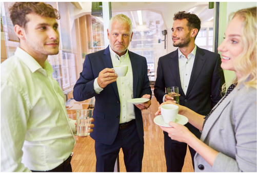 Illustration of a professional taking a short break with coffee—symbolizing pause, reflection, and the balance between productivity and renewal. This image can also be used as a image of professionals networking over coffee.