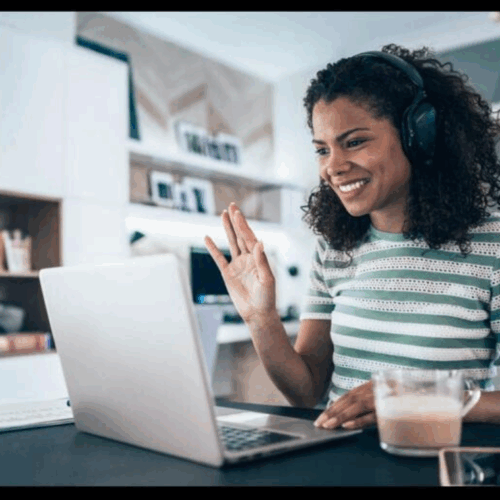 Illustration of a virtual meeting with people connecting on screen—symbolizing collaboration, coaching, and professional growth in an online space.